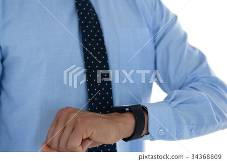 Mid section of businessman with smartwatch 34368809
