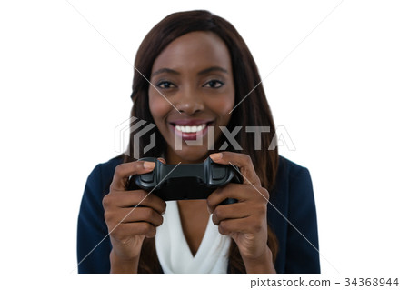 Close up of smiling businesswoman playing video game Close up of smiling businesswoman playing video game 34368944