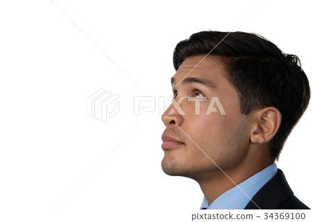 Side view of businessman looking up 34369100