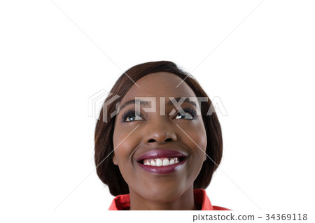 Close up of cheerful woman looking up Close up of cheerful woman looking up 34369118
