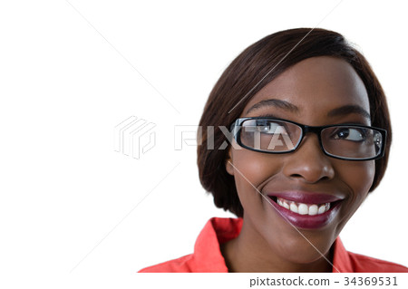 Close up of happy young woman looking away Close up of happy young woman looking away 34369531