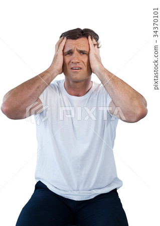 Frustrated mature man with head in hand 34370101