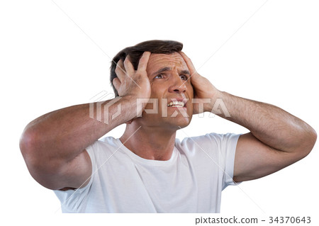 Mature man with head in hand looking away 34370643