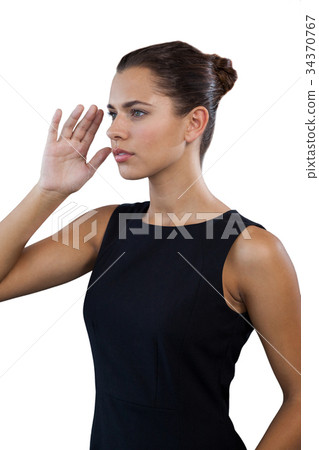 Thoughtful businesswoman looking away Thoughtful businesswoman looking away 34370767