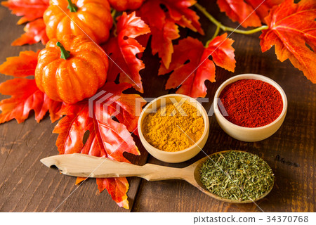 Fall background spices and leaves with pumpkins 34370768