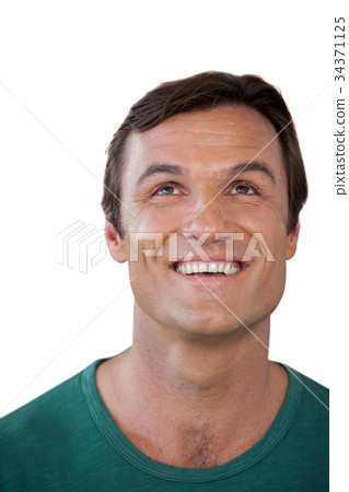 Happy thoughtful mature man looking up 34371125