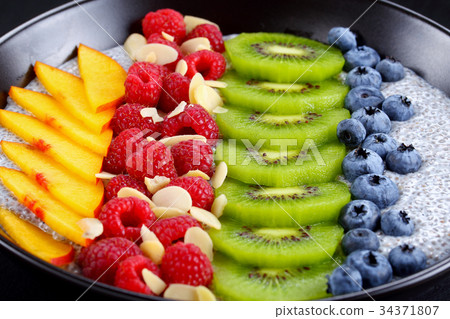 delicious chia seeds pudding in bowl delicious chia seeds pudding in bowl 34371807