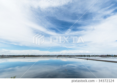 Blue sky and white cloud, salt farming  34372124