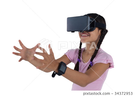 Teenage girl using virtual reality headset 34372953