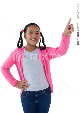 Girl pressing an invisible virtual screen Girl pressing an invisible virtual screen 34373045