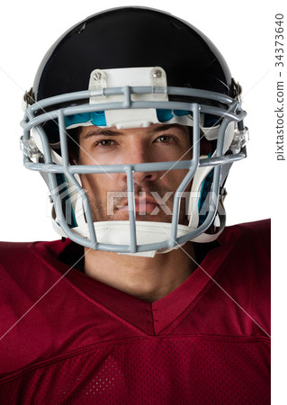 Portrait of American football player wearing helmet 34373640