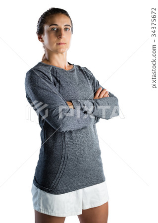 Portrait of confident female coach with arms crossed 34375672