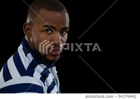 Close up portrait of confident rugby player Close up portrait of confident rugby player 34376442