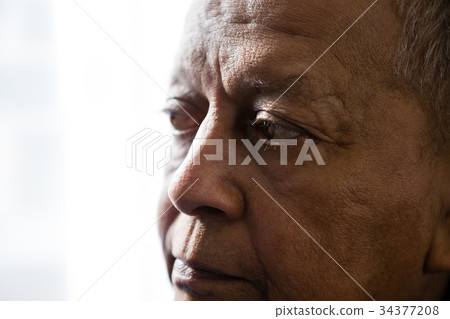 Close up of thoughtful man looking away 34377208