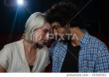 Couple having romantic moment Couple having romantic moment 34380563