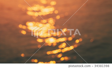 water glittering in sunset water glittering in sunset 34381398