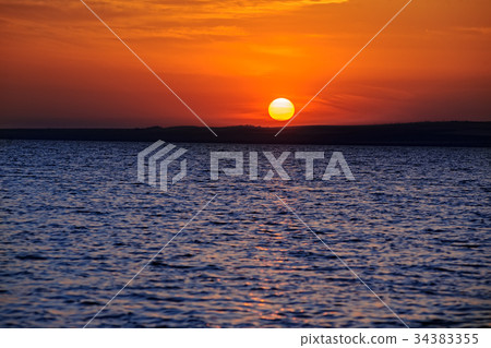 Marine sunset on Taman Gulf. Timelapse 34383355