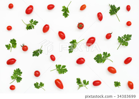 Pattern of red mini tomatoes, parsley on white Pattern of red mini tomatoes, parsley on white 34383699