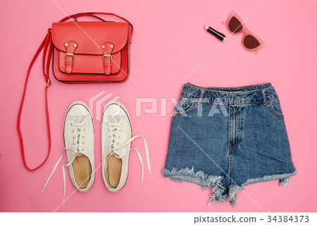 Denim shorts, white sneakers, red handbag 34384373