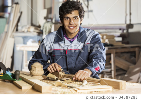 Carpenter at work 34387283