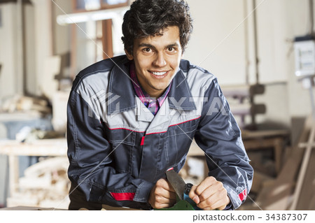 Carpenter at work 34387307
