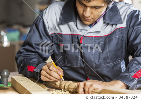 Carpenter at work 34387324