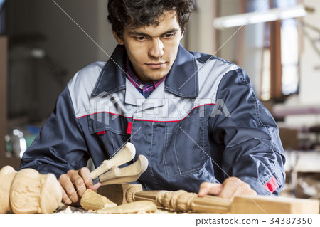 Carpenter at work 34387350