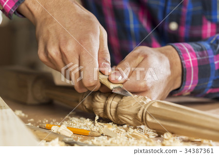 Carpenter at work 34387361