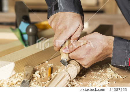 Carpenter at work 34387363