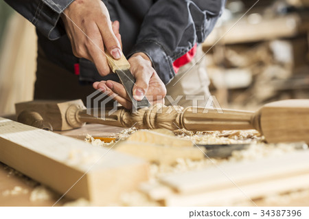 Carpenter at work 34387396
