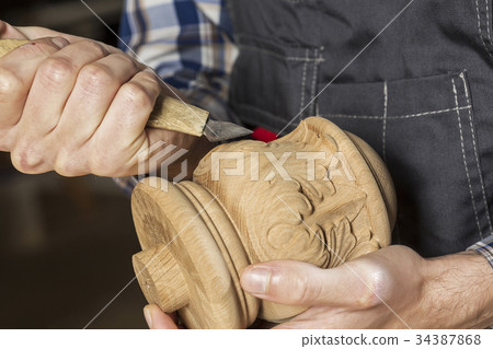 Carpenter at work 34387868