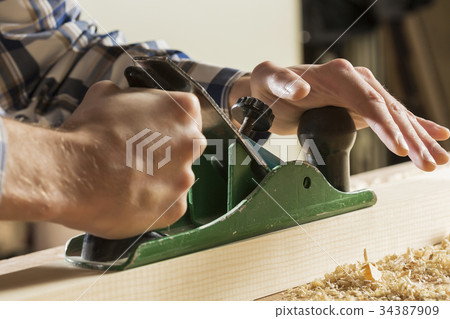 Carpenter at work 34387909