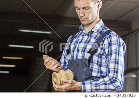 Carpenter at work 34387926