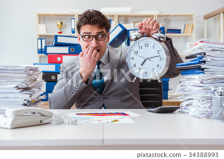 Businessman missing deadlines due to excessive Businessman missing deadlines due to excessive 34388993