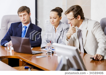 Business team meeting Business team meeting 34389406