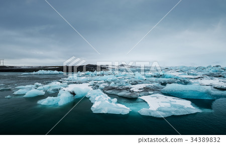 Melting ice on the water in Iceland.Global warming 34389832