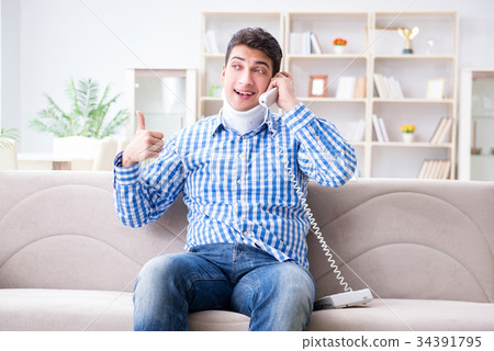 Man with a head neck spine trauma wearing a neck Man with a head neck spine trauma wearing a neck 34391795