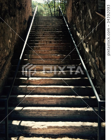 Sunshine on the old stone steps 34392093
