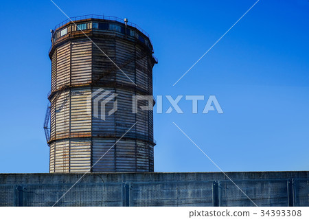 Water tower on a roof  34393308