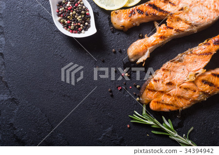 Grilled salmon steak 34394942