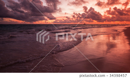 Red sunrise over Atlantic Ocean coast, Bavaro 34398457
