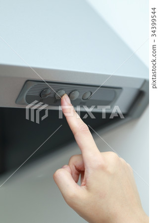 Housewife (Range hood ventilation fan female switch button finger body parts kitchen kitchen faceless) 34399544