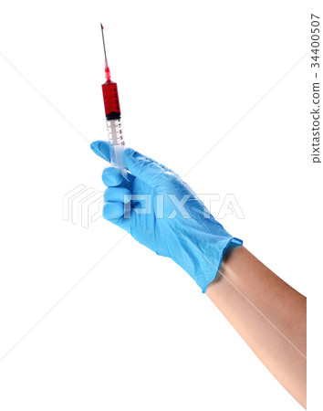 Hand in a blue glove holding syringe Hand in a blue glove holding syringe 34400507