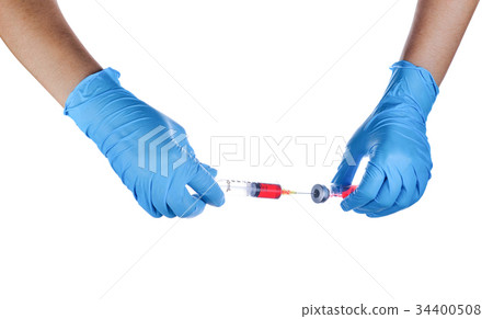 Hand in a blue glove holding syringe Hand in a blue glove holding syringe 34400508