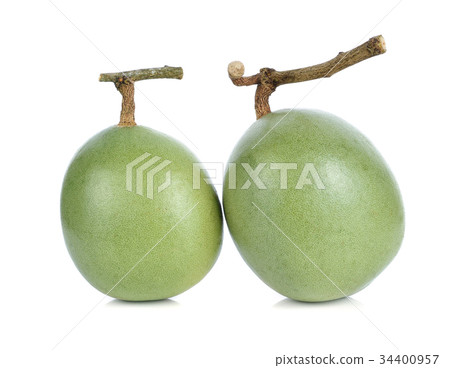 Aegle marmelos and bael fruit on white background 34400957
