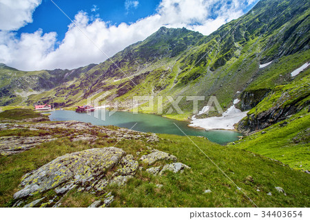 Mountain lake. The lake between the rocks. Hotels Mountain lake. The lake between the rocks. Hotels 34403654