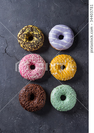 Colorful glazed donuts 34403781