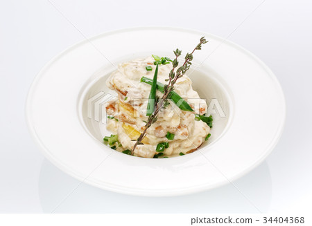 Restaurant food. Salad with bread in a plate 34404368