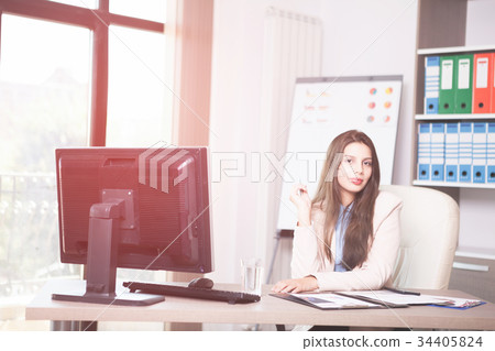 Young professional businesswoman working in the Young professional businesswoman working in the 34405824