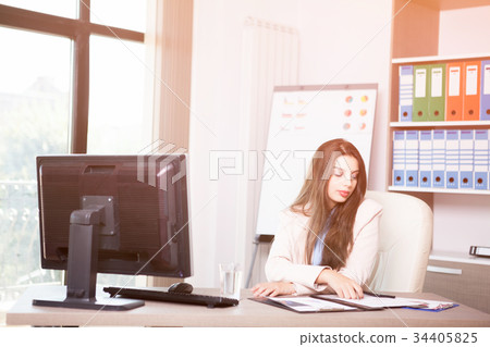 Young professional businesswoman working in the Young professional businesswoman working in the 34405825